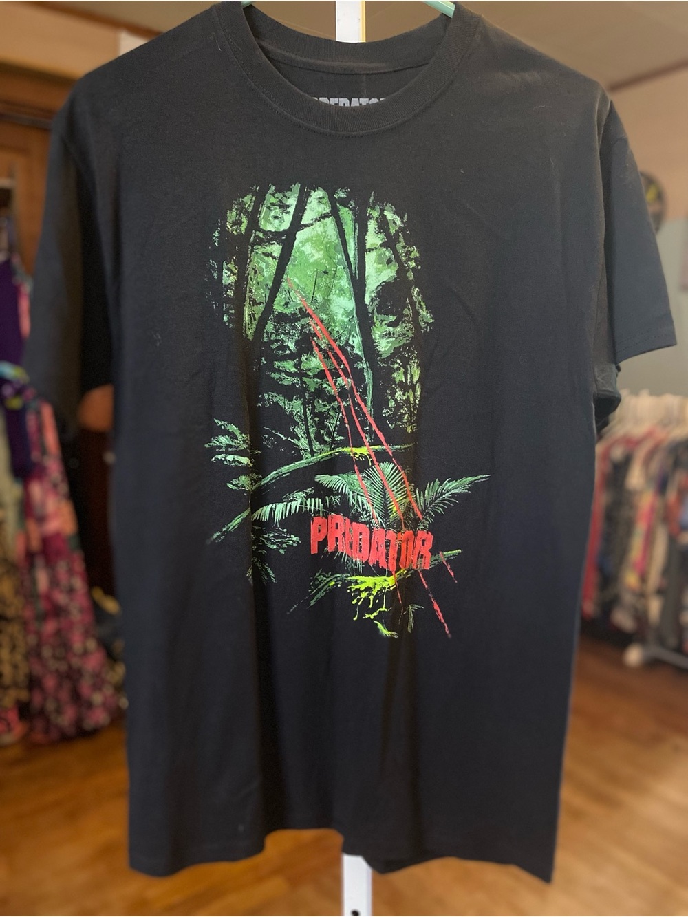 Men's Black Short-Sleeve Tee with Green JungleSkull Graphic and Red Accent